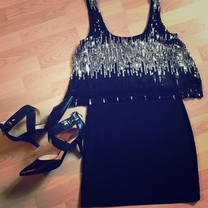Short black cocktail dress.